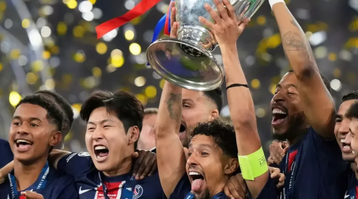 PSG lifting their first Champions League Trophy ever.